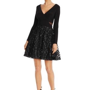 Aqua floral appliqué fit and flare dress in black, from Bloomingdales, size 2
